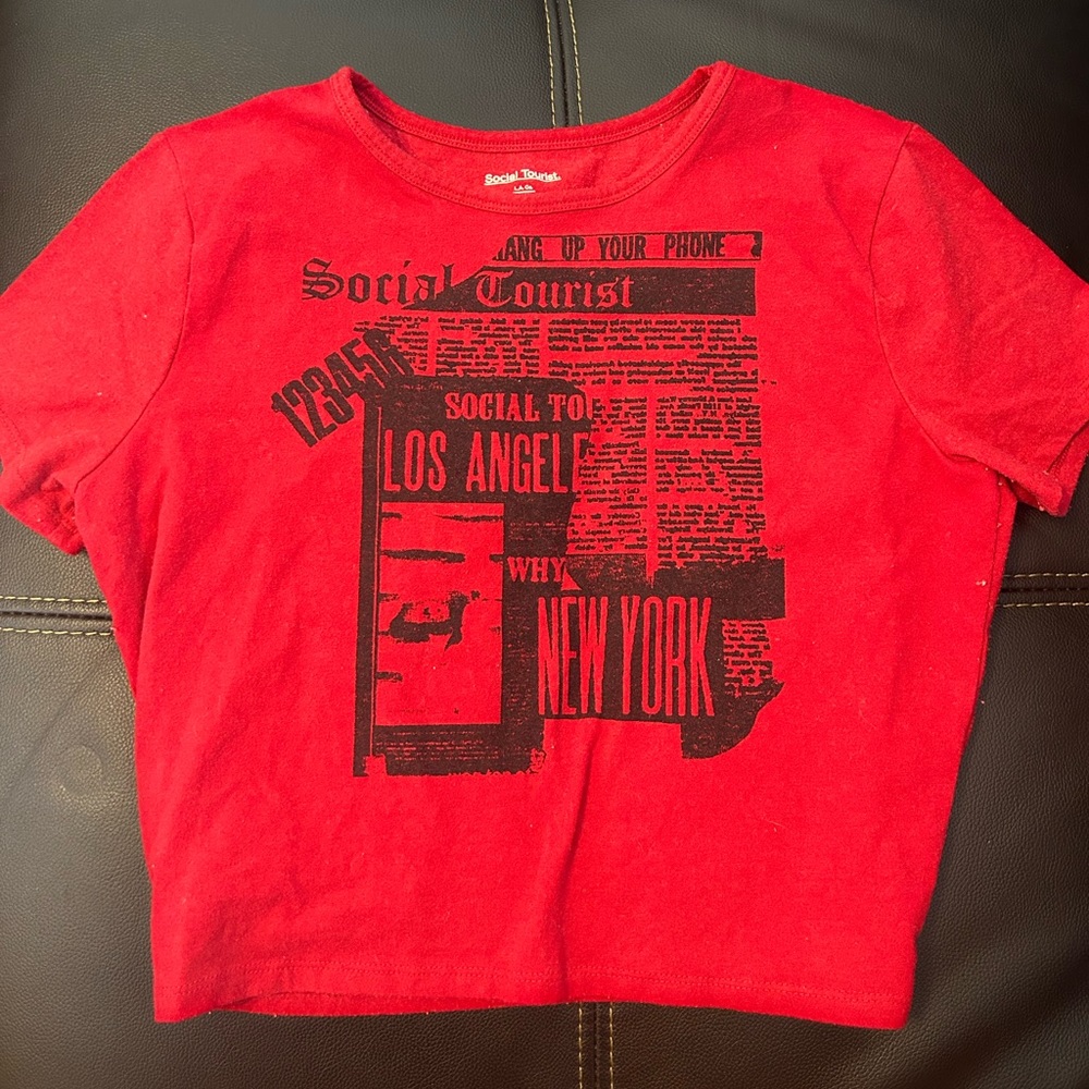 Social Tourist red graphic baby tee